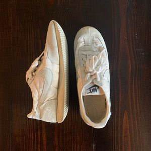 Classic Nike shoes, low top teal and white size 7.5